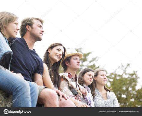 Group Young People Together Outdoors Looking Away Distance Horizontal