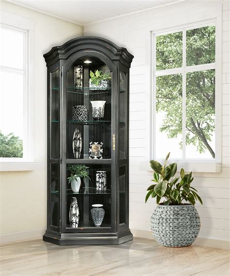 Spacious solid wood curio that's. corner curio cabinet - Small Living Room Design Ideas and ...