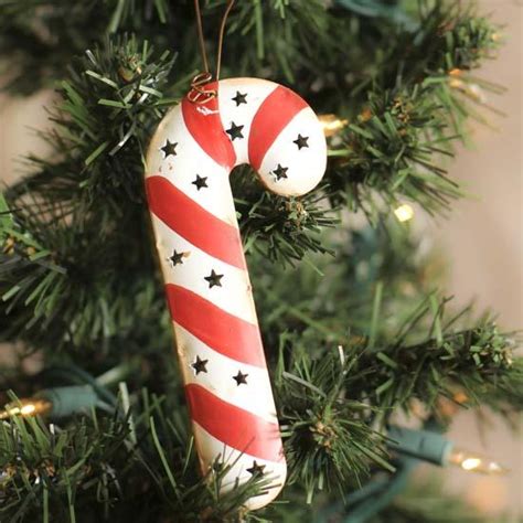 The holiday season is upon us, and it's time to bust out those holiday craft supplies to make a candy cane ornament! Rustic Metal Candy Cane Ornament - Christmas Ornaments ...