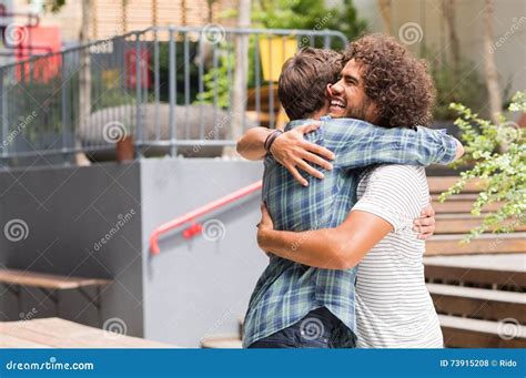 Friends Embracing Each Other Stock Photo Image Of Young Smile 73915208