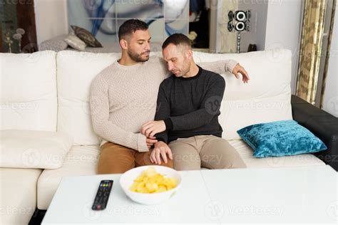 Gay Couple Chilling On Sofa At Home 7990285 Stock Photo At Vecteezy
