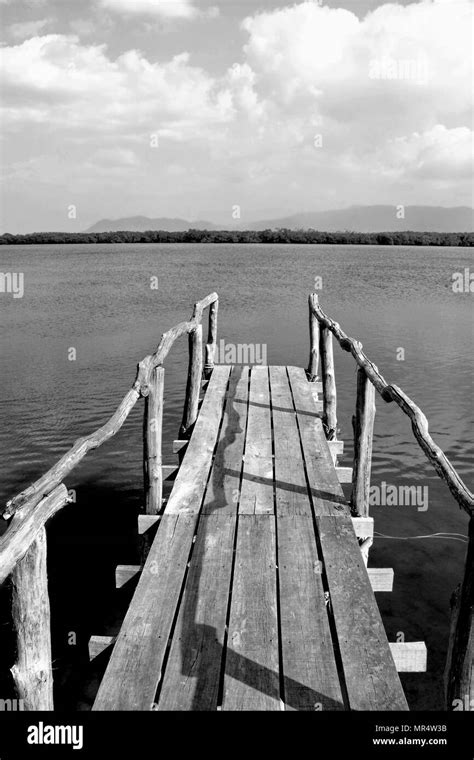 Old Wooden Bridge Or Pier To The Sea In Black And White Thailand Stock