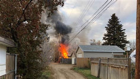 Early morning blaze engulfs garage, affects power lines | CTV News