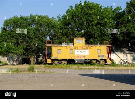 A Union Pacific Caboose Sits On An Abandoned Railroad Siding In