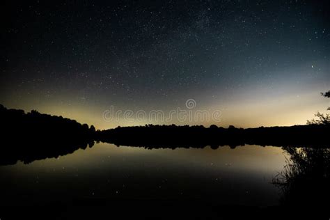 Stars And Milky Way Reflected On The Lake At Night Stock Image Image