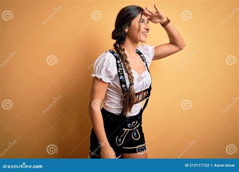 Young Beautiful Brunette German Woman Celebrating Octoberfest Wearing