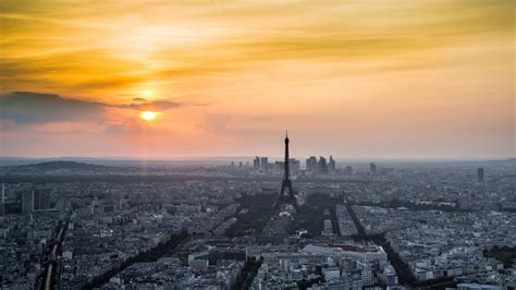 Cityscape Of France Paris And Eiffel Tower With Yellow Sky Background