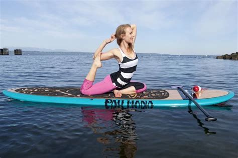 paddleboard yoga is both fun and accessible to everyone carly hayden demonstrates 8 paddleboard