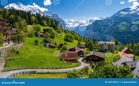 Landscape Of Alpine Village Wengen During Spring Sunny Day In