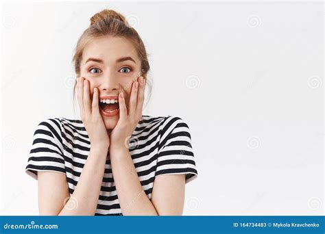 excited and amused surprised gorgeous modern woman in trendy dress