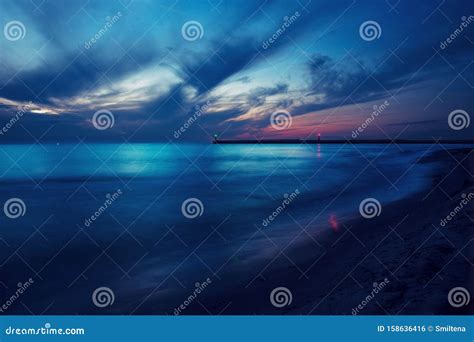 Beautiful Seascape With Two Lighthouses At Blue Hour Stock Photo