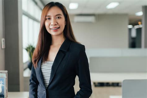 Free Stock Photo Of Portrait Of Female Employee Smiling At The Camera Download Free Images And