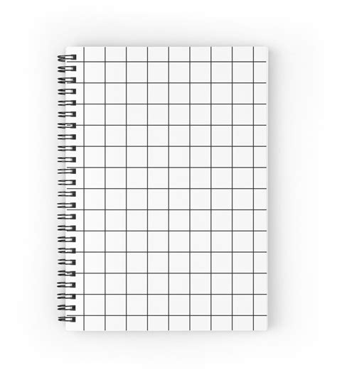 A Spiral Notebook With Black And White Squares