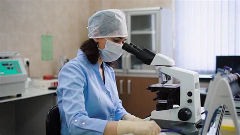 Lab Workers Wearing Protective Uniform Scientists Wearing Lab Coat In