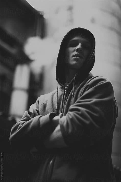 Black And White Portrait Of A Man In A Hooded Sweatshirt Del