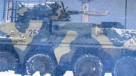 An Armored Personnel Carrier Of The Ukrainian Army Is Driving Through