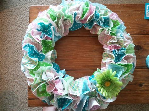 Learn how to make a cupcake liner butterfly using a clothespin, glitter, and glue! cupcake liner wreath | Crafty craft, Flower crafts, Diy crafts