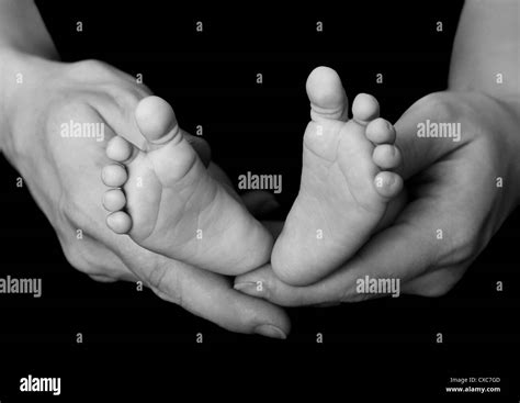 Big Feet And Little Feet Hi Res Stock Photography And Images Alamy