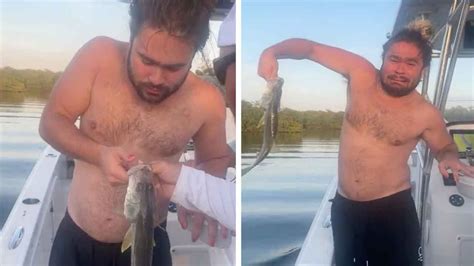 Guy Freaks Out Whilst Holding Fish For Photo Youtube