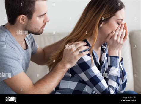 Caring Man Comfort Crying Wife Making Peace After Fight Stock Photo Alamy