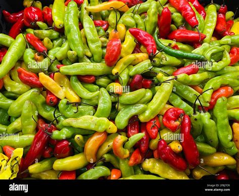 Colourful Mix Of Red And Green Chilli Peppers Used In Preparing Hot