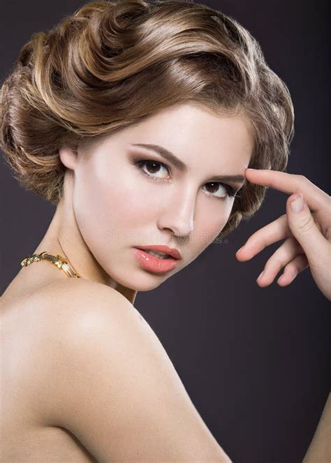 Beautiful Blonde In A Hollywood Manner With Curls Natural Makeup And Red Lips Beauty Face And