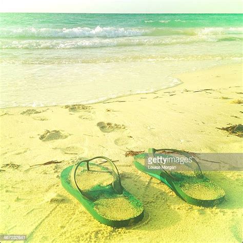Thongs Footprints Sand Photos And Premium High Res Pictures Getty Images