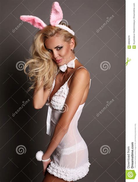 Download our app for ios and android! Blond Girl With Bunny Ears Head Accessory, Symbol Of Easter Holiday Stock Image - Image of hair ...