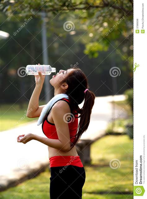 Slim Young Woman Drinking Water After Exercises Stock Photo Image Of