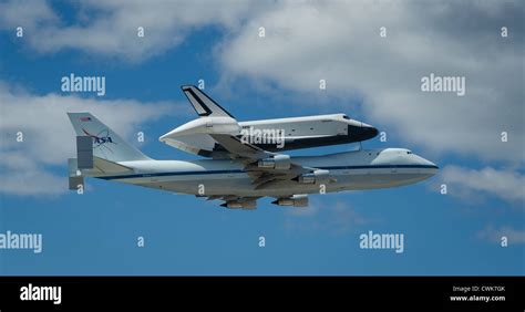 Space Shuttle Enterprise Mounted Atop A Nasa 747 Shuttle Carrier