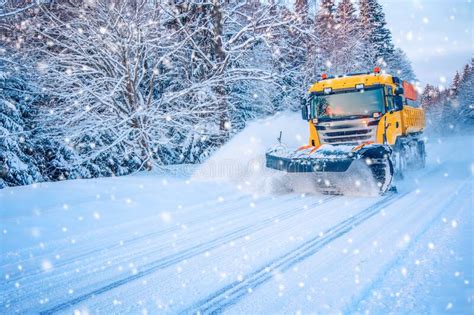 Snow Plow Truck Cleaning Road In Snowstorm Stock Image Image Of