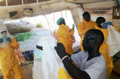 As Ebola Virus Spreads In West Africa Some Blame Health Workers La Times