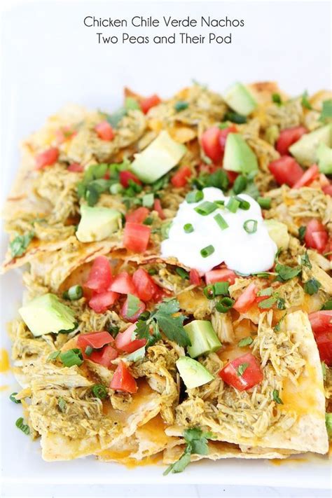 This creamy and mildly spicy slow cooker chicken chili is our family's staple dinner recipe. Chicken Chile Verde Nachos | Slow Cooker Nachos Recipe ...