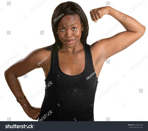 Smiling Black Woman Flexes Her Bicep Stock Photo 109634459 Shutterstock