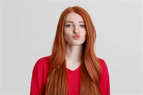 Adorable Red Haired Female With Freckled Skin Rounds Lips Going To