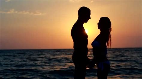 couple silhouette at the beach sunset light — stock video © dmitry ps 24663559