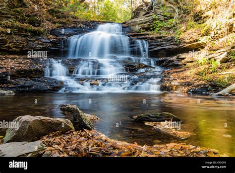 Waterfalls Are Surrounded By Colorful Fall Foliage At Ricketts Glen