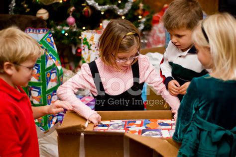 Opening Christmas Presents Stock Photo  RoyaltyFree  FreeImages