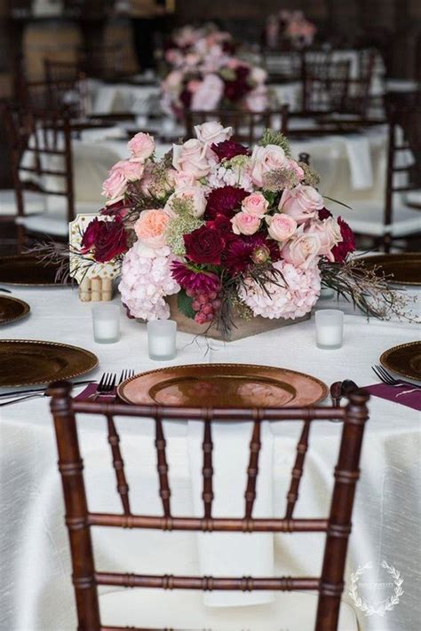 Once you have determined your budget for the centerpieces, you you may want to also consider using succulents or tropical plants to create a unique look for the centerpieces.4 x research source. Trending-10 Burgundy and Blush Wedding Centerpieces for ...