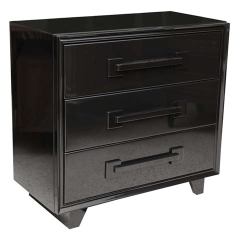 The black lacquer bedroom furniture stands as a fine contrast both to the white painted wall and the unaltered wooden ceiling and wooden floors, which together combine the light and the dark, the hot. An Italian Modern Black Lacquer 3 Drawer Chest at 1stdibs