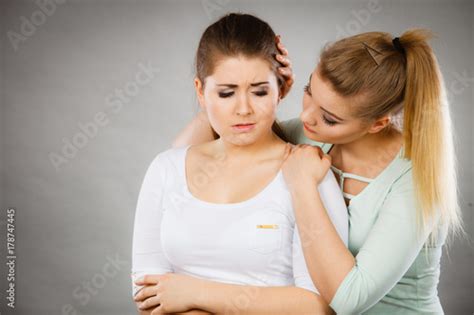 Woman Hugging Her Sad Female Friend Stock Photo And Royalty Free