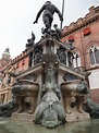 The debauched fountain of Neptune in the main square of Bologna, Italy ...