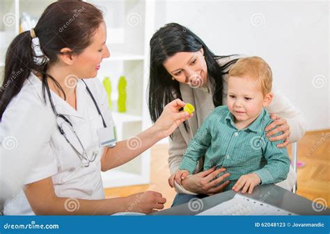 Young Woman And Her Child At The Doctor Homeopaths Stock Image Image