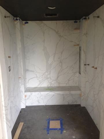 Home >> shower surrounds >>calacatta marble shower wall tiles. 1cm Marble slab shower walls - Homchick Stoneworks, Inc.