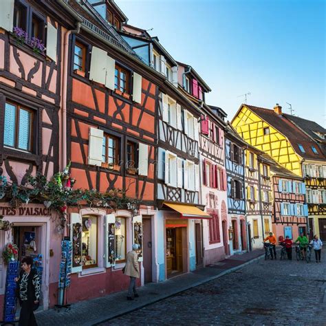 Colorful Traditional French Houses And Shops In Colmar Alsace
