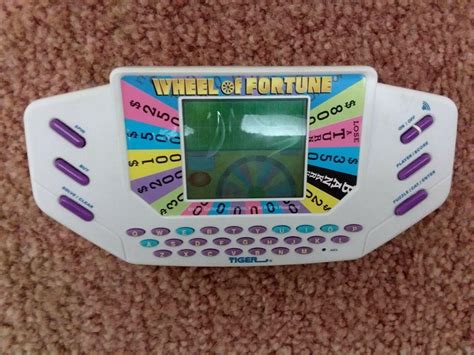 Vintage 1995 Wheel Of Fortune Tiger Electronics Handheld Video Game W
