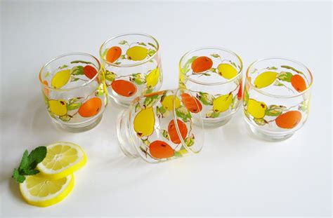 These glasses were inspired by glassware found at a parisian flea market, according to pottery barn. Vintage, Rocks Glasses, Drinking Glasses, Oranges, Lemons ...