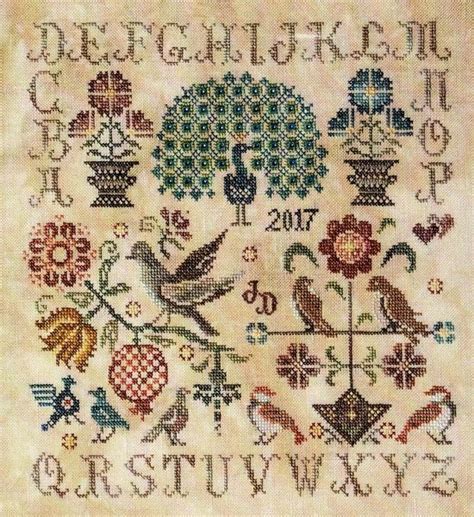 A Pretty Alphabet Sampler With Flowers And Birds From The Humble