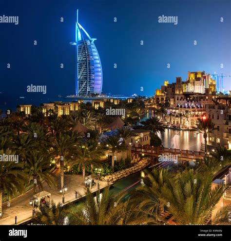 View Of Illuminated Burj Al Arab Skyscraper In Dubai United Arab
