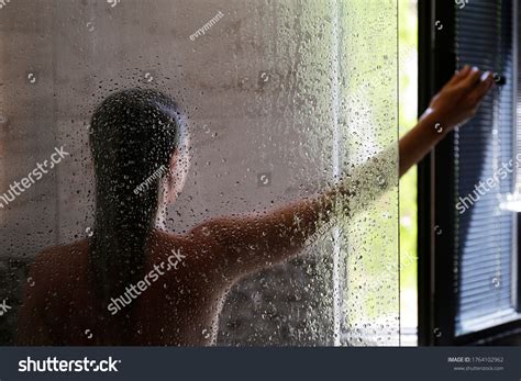 Стоковая фотография 1764102962 Back View Naked Woman Shower Cabin Shutterstock